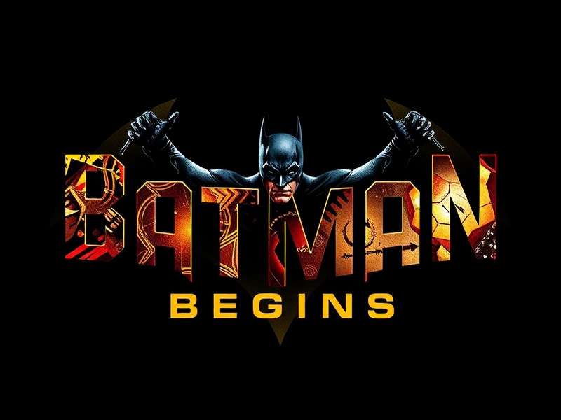 Close-up of Batman Begins Logo showing asymmetrical wing design and metallic texture